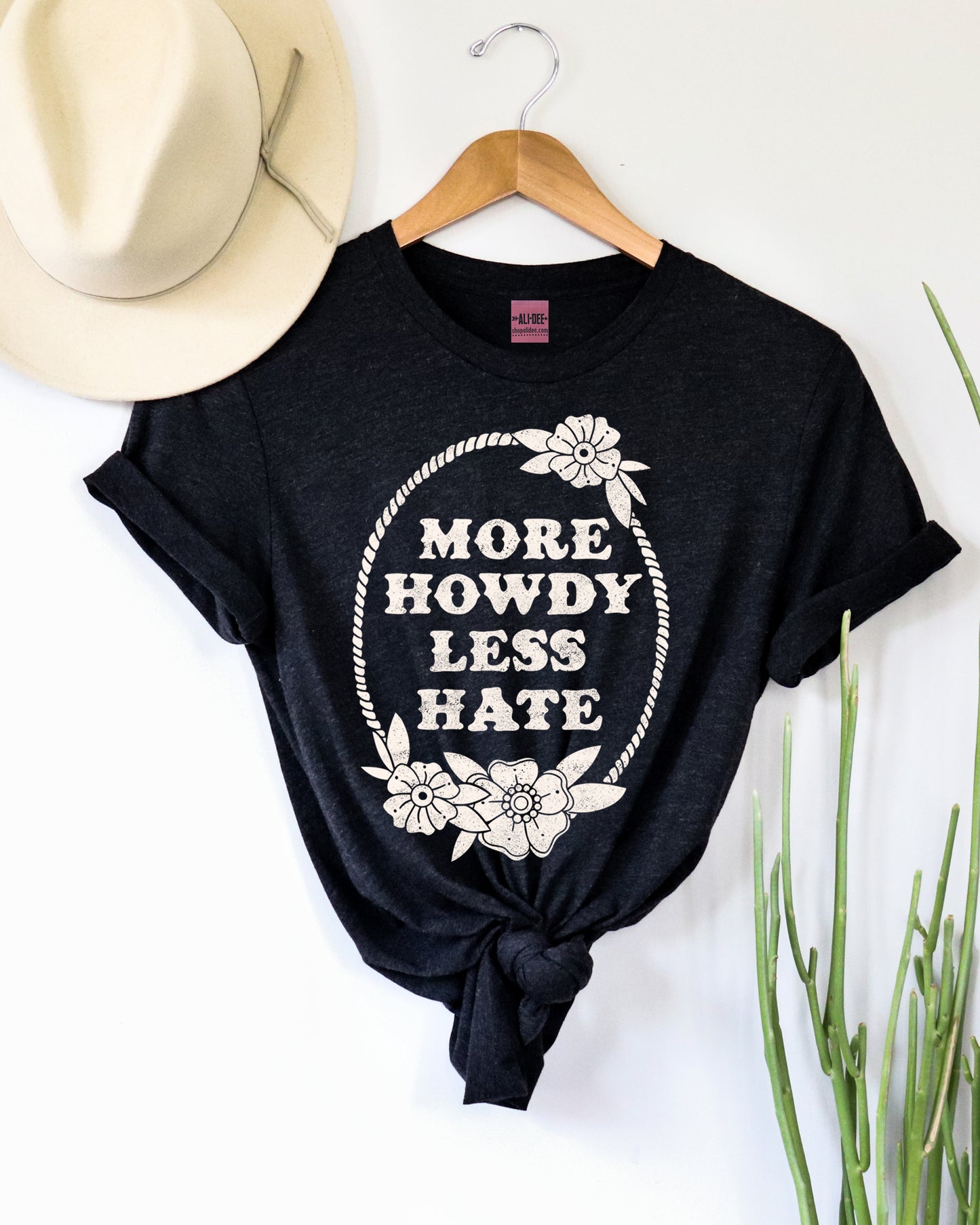 western tshirt featuring the statement more howdy less hate western tshirt